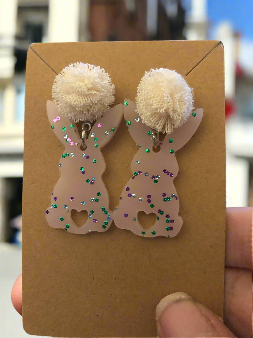 bunny earrings with a frilly toppeer