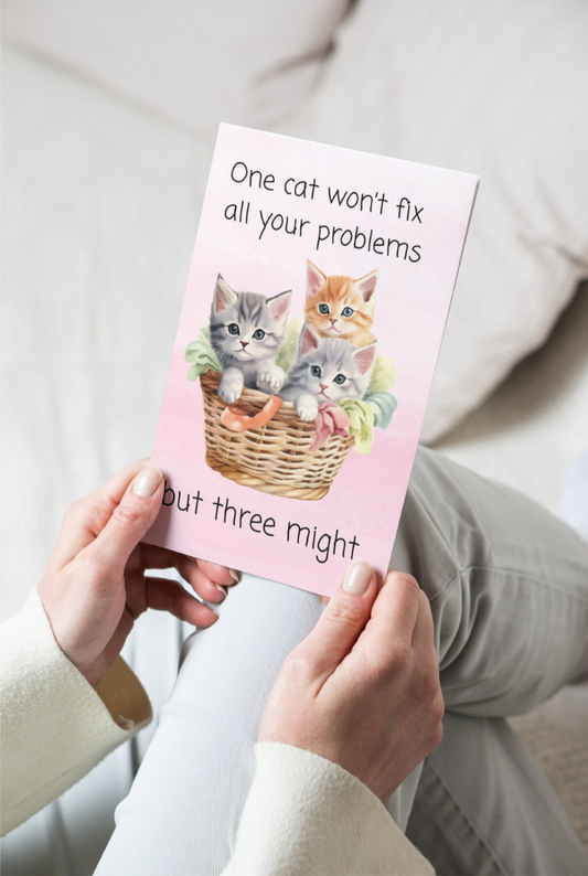 Greeting card with kittens on it and text one cat won't fix all your problems but three might