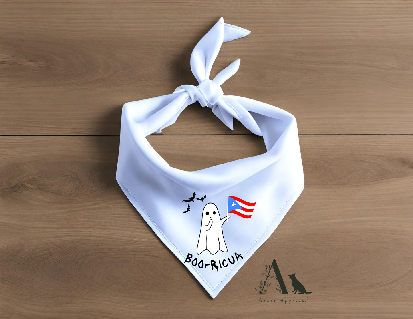 White bandana with a ghost and flag design on a wooden surface