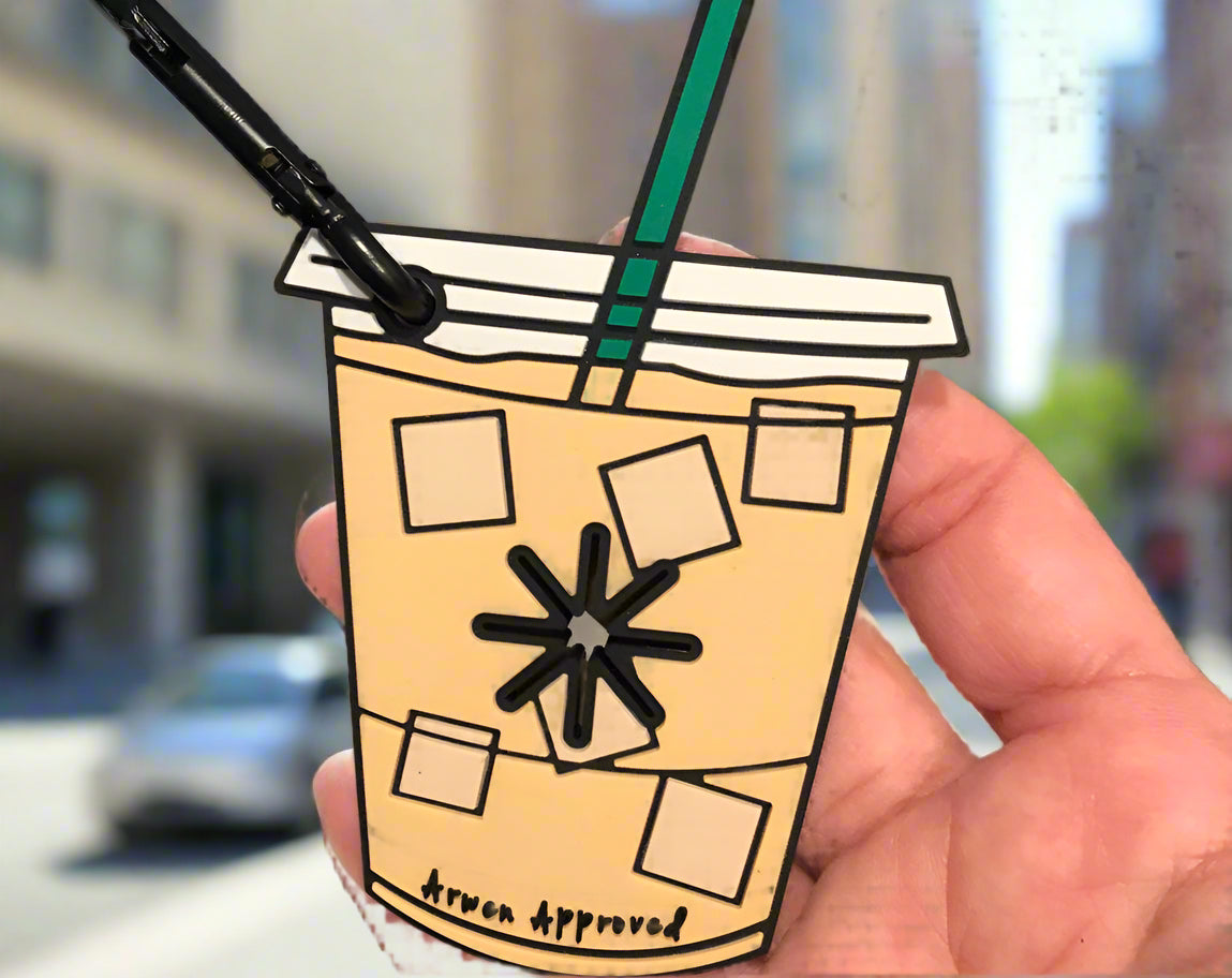Silicone hands free waste bag holder in iced coffee shape
