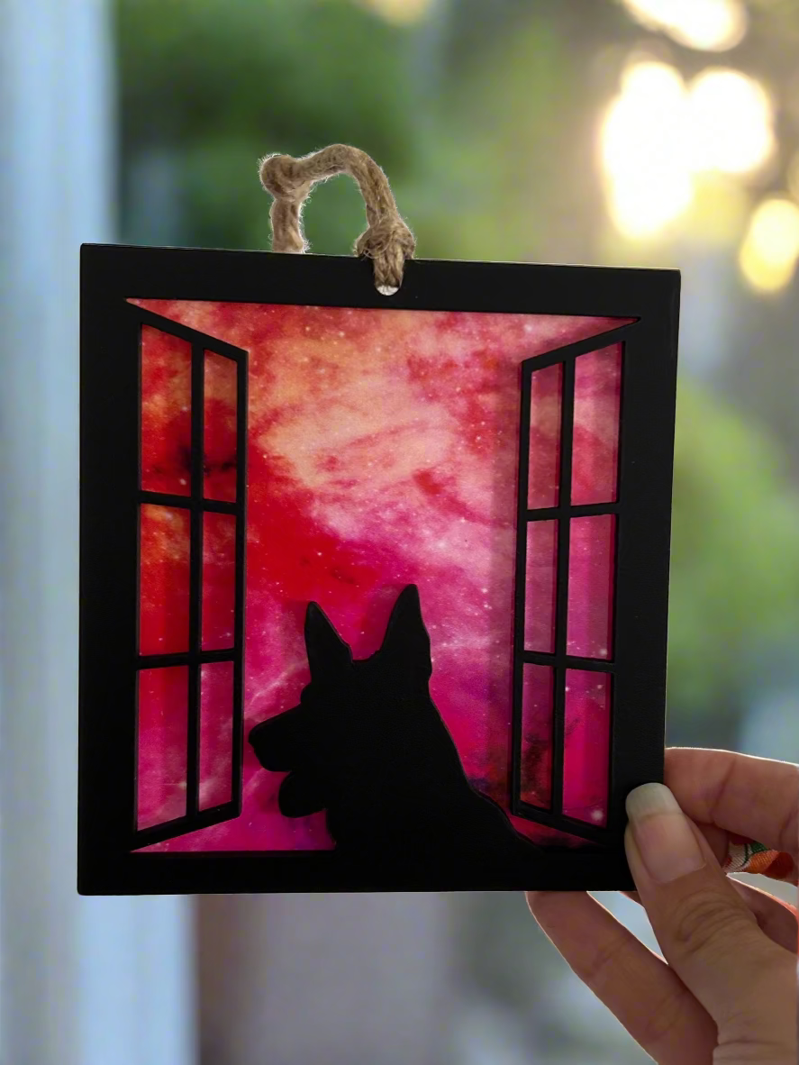 person holding suncatcher
