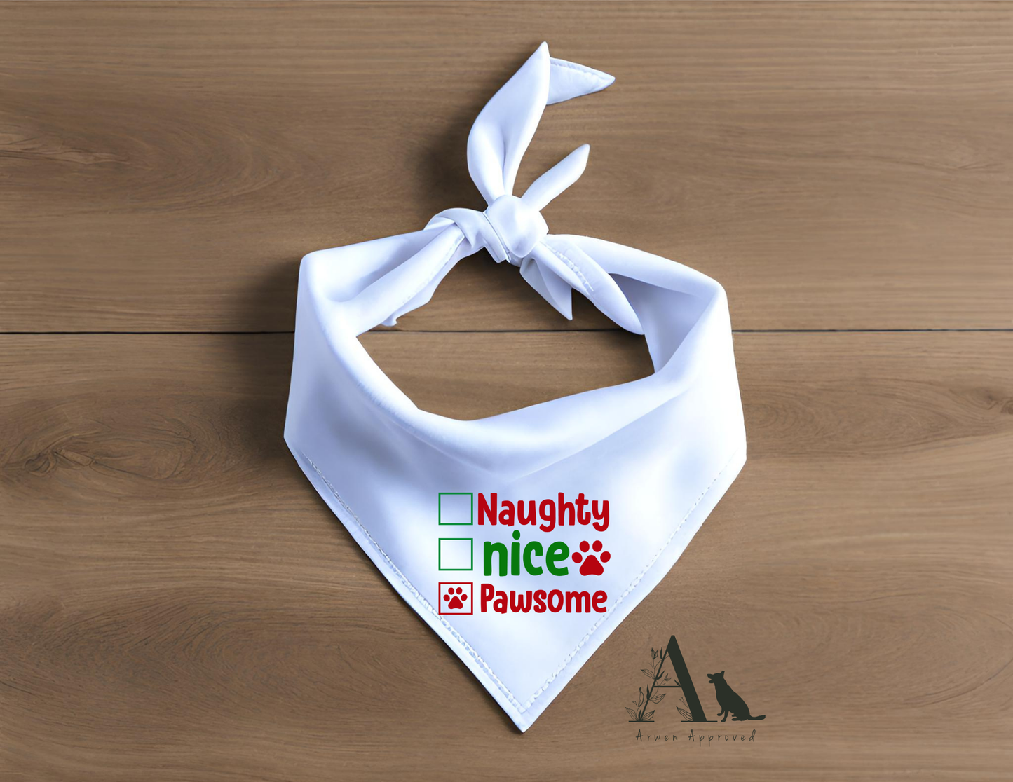 White dog bandana with humorous text on a wooden surface