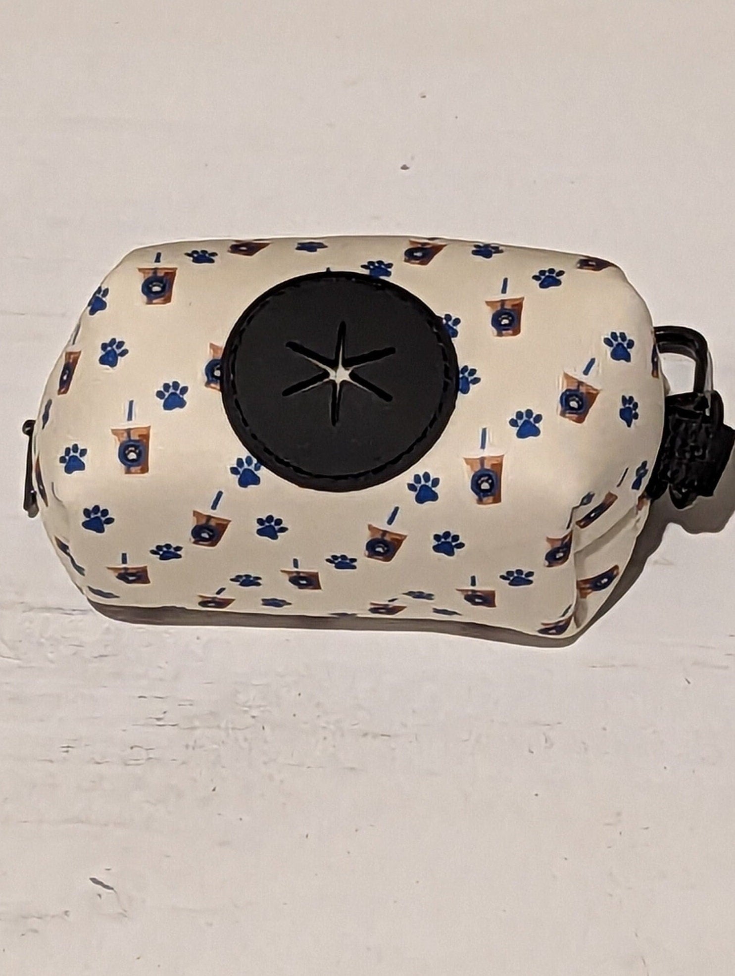 Neoprene coffee and paw print poop bag holder