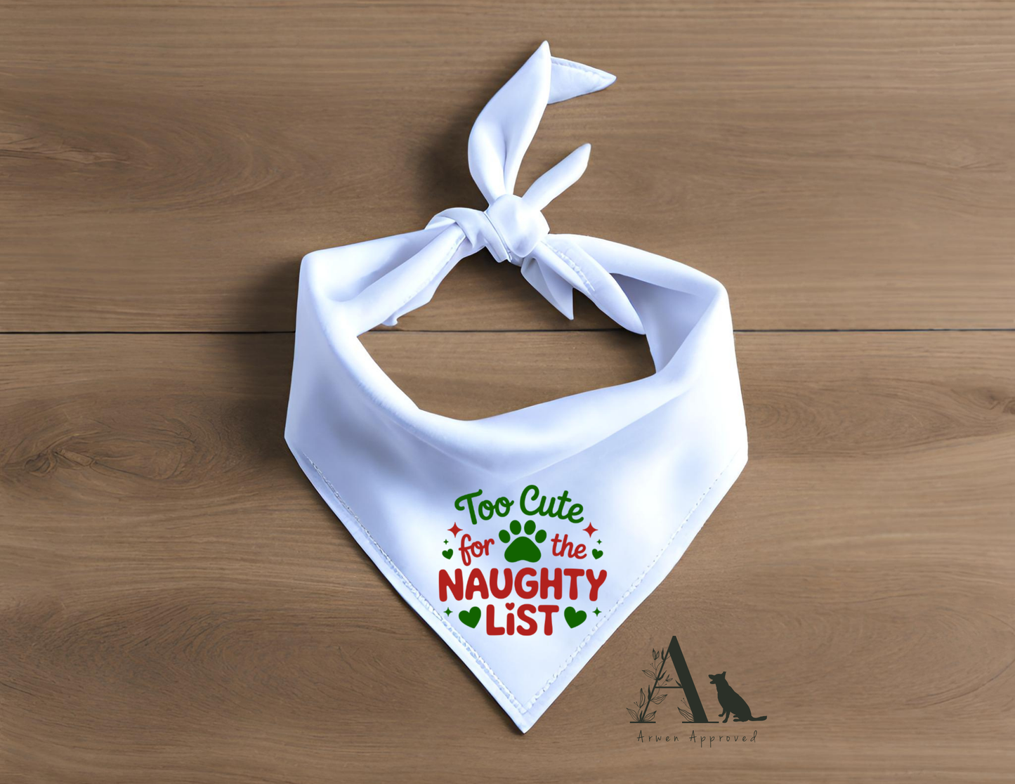 White dog bandana with text on a wooden surface