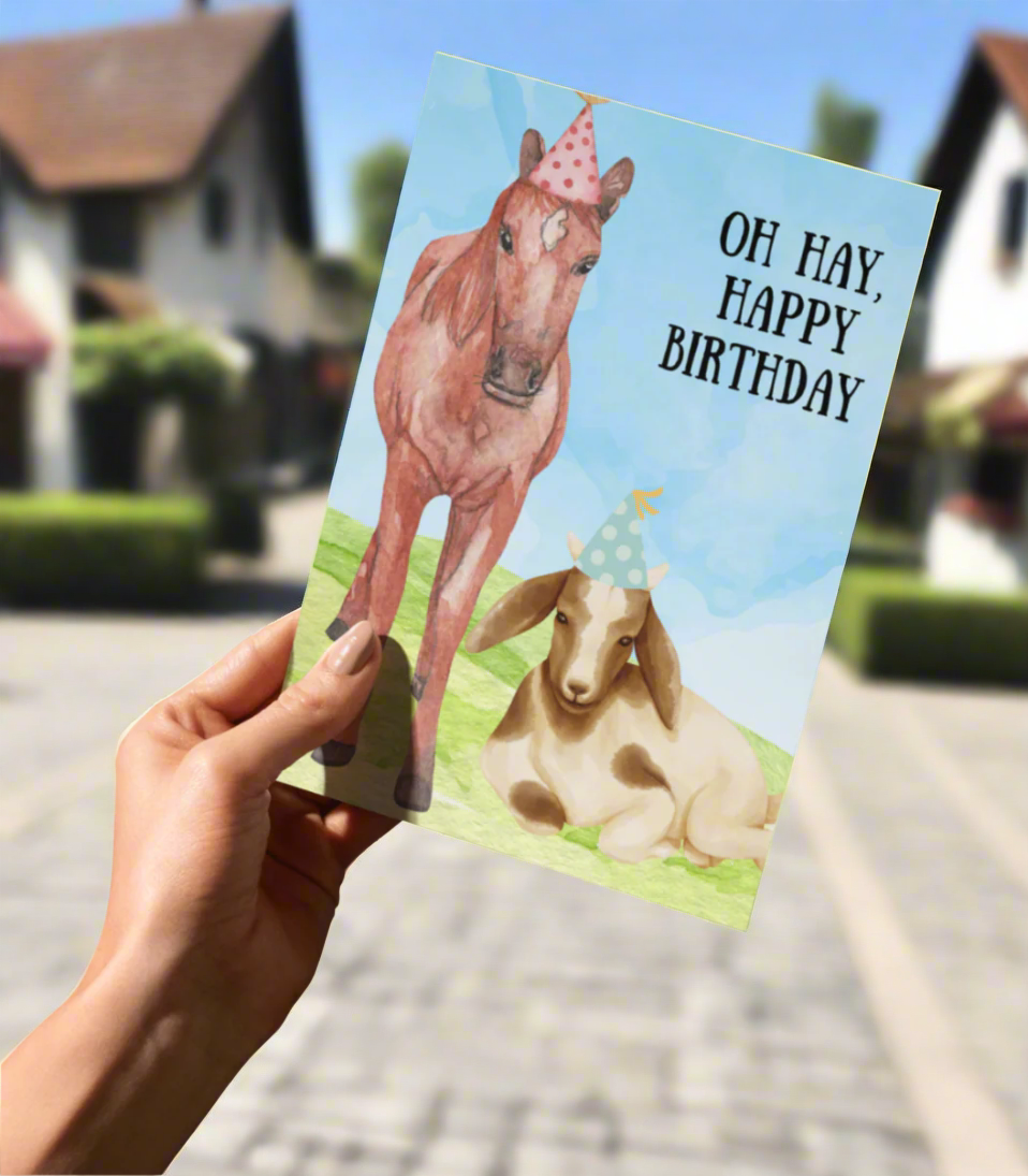 greeting card with a horse and a goat wearing birthday hats and text that says oh hay, happy birthday