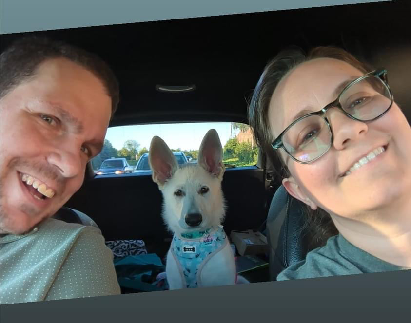 Founder with dog in a candid photo