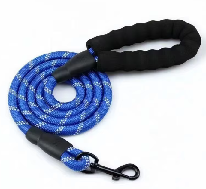 Blue dog leash with black handle on a white background