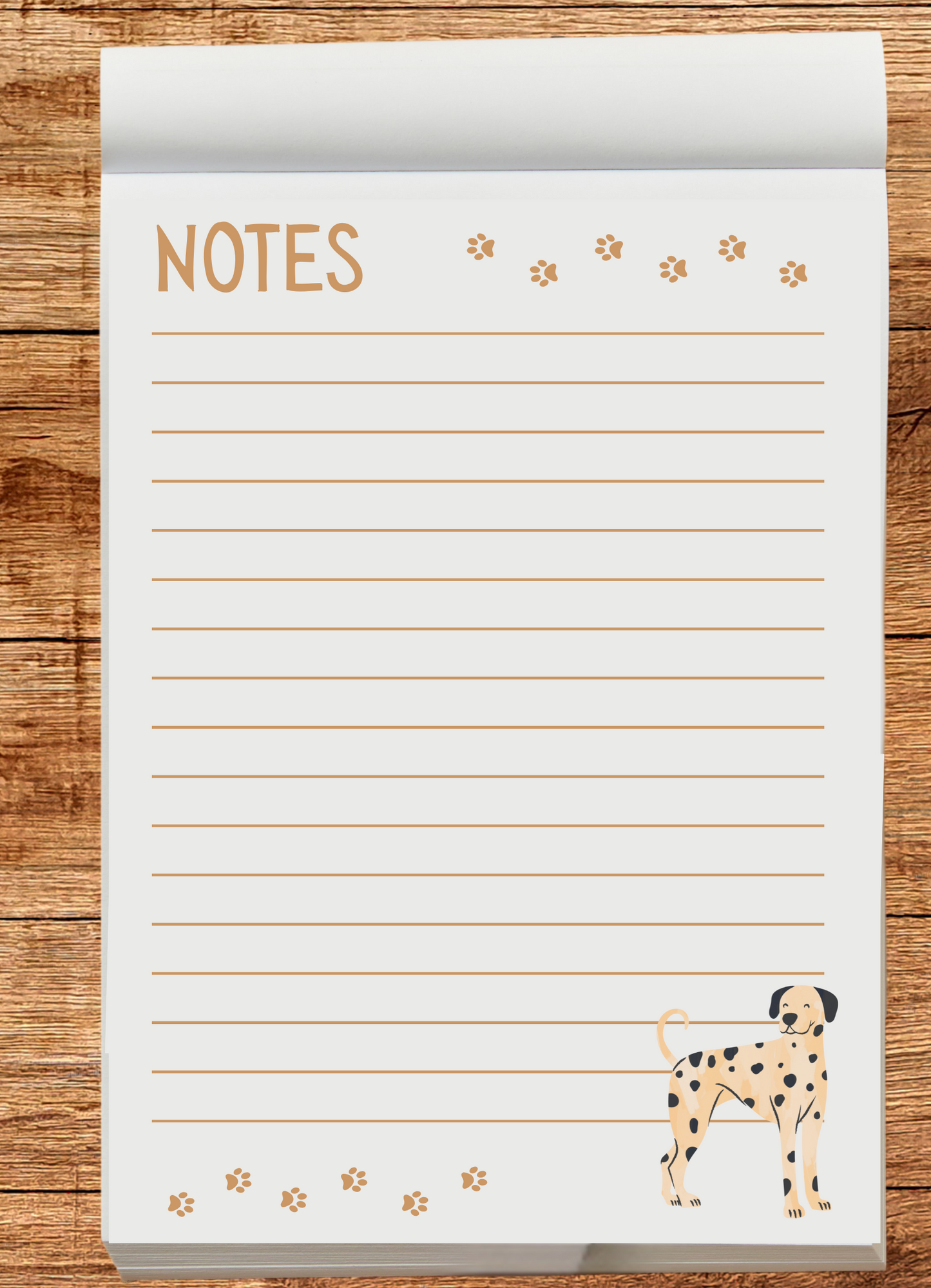 Notepad with a Dalmatian design on a wooden surface