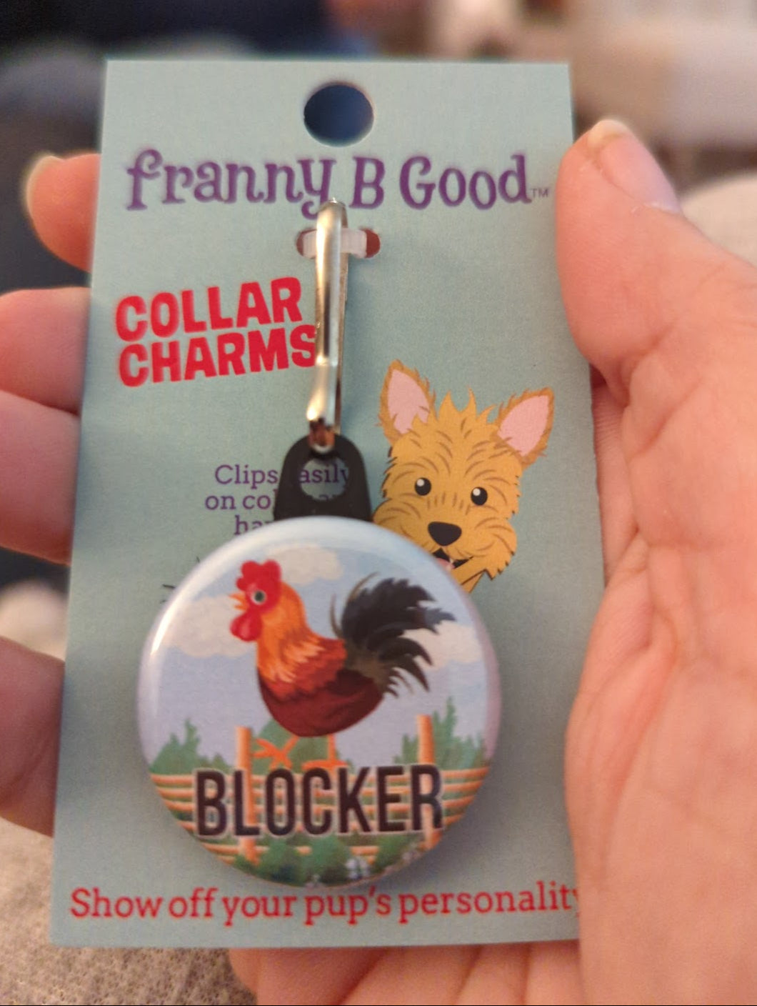 Collar charm with a rooster on it and text "cock blocker"