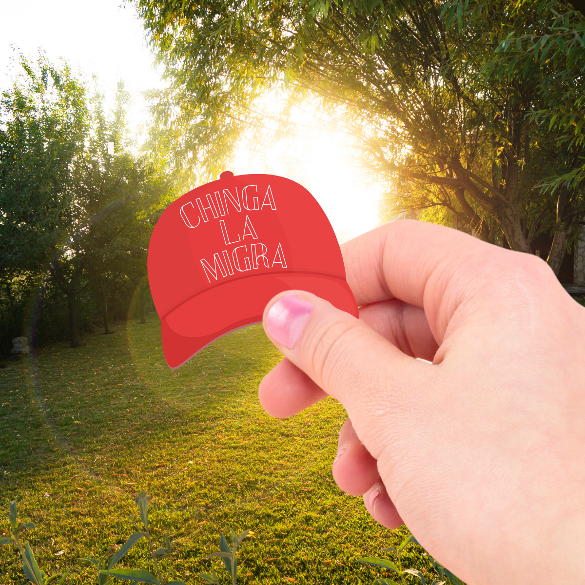 Person holding a red hat sticker that says Chinga la Migra