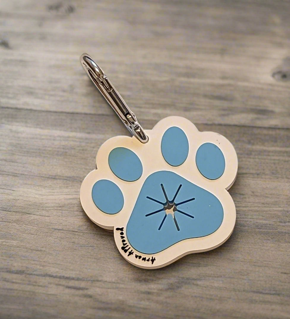 Silicone paw print blue and white hands free waste bag holder
