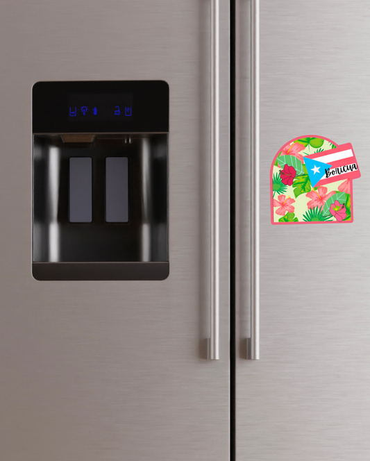 Stainless steel refrigerator with a floral design magnet featuring the Puerto Rican flag.